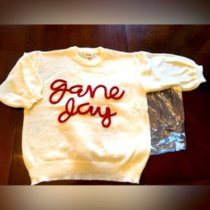 BiBi Game Day Cream sweater. Red glitter lettering. Size Small. Out of package.